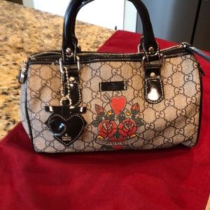 Cute, small Gucci purse vinyl canvas, two handles